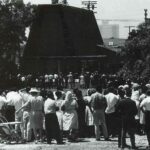 Fans looking over the walls of Westwood Cemetery
